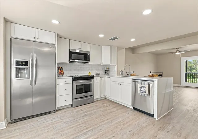 Photo 3 of Townhouse for sale at 1202 Brigadoon Dr, Clearwater, FL 33759 | MLS# TB8549419 | Listing updated on 2026-09-18