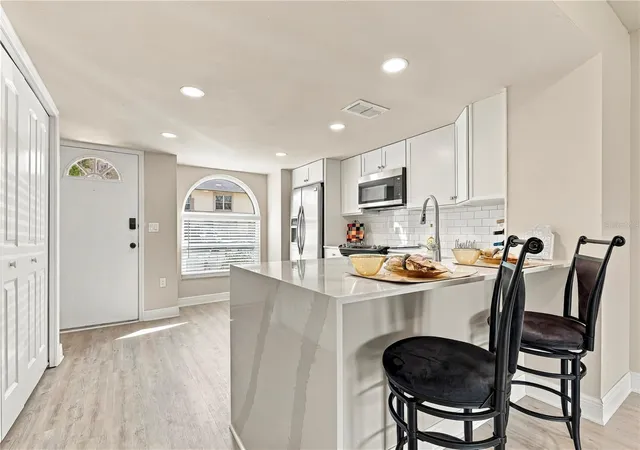 Photo 4 of Townhouse for sale at 1202 Brigadoon Dr, Clearwater, FL 33759 | MLS# TB8549419 | Listing updated on 2026-09-18
