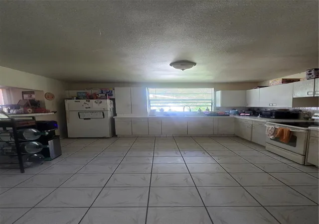 Photo 2 of Single family home for sale at 1208 E 26th Avenue, Tampa, FL 33605 | MLS# TB8549421 | Listing updated on 2026-10-16