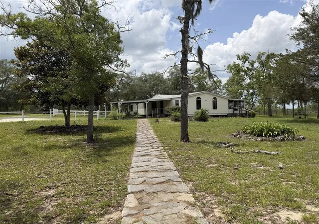 Photo 2 of Manufactured home for sale at 13351 Se 101st Place, Dunnellon, FL 34431 | MLS# OM732413 | Listing updated on 2026-09-22