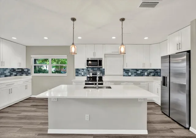 Photo 3 of Single family home for sale at 7505 W Henry Ave, Tampa, FL 33615 | MLS# TB8549465 | Listing updated on 2026-09-18