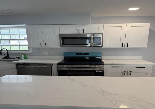 Photo 3 of Single family home for sale at 413 S Deerwood Ave, Orlando, FL 32825 | MLS# O6442628 | Listing updated on 2026-09-20