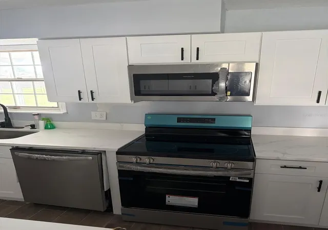 Photo 4 of Single family home for sale at 413 S Deerwood Ave, Orlando, FL 32825 | MLS# O6442628 | Listing updated on 2026-09-20