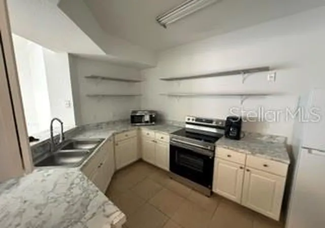 Photo 2 of Condo for sale at 5536 Metrowest Blvd #8-101, Orlando, FL 32811 | MLS# O6442662 | Listing updated on 2026-10-06