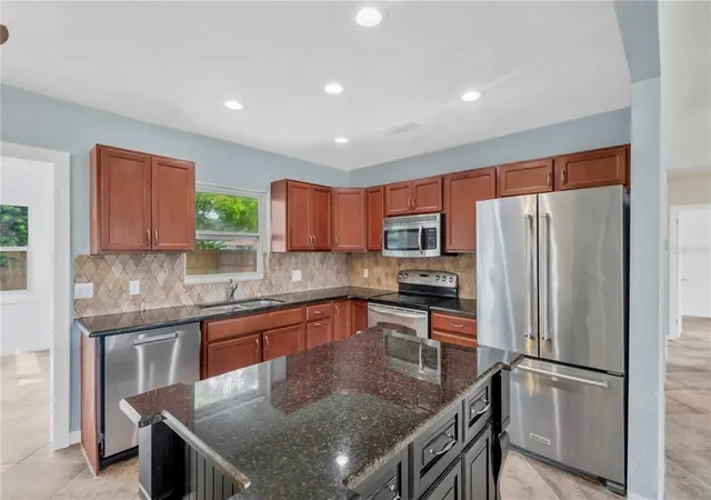 Photo 1 of Single family home for sale at 1801 Carlton Dr, Clearwater, FL 33759 | MLS# TB8549514 | Listing updated on 2026-09-29
