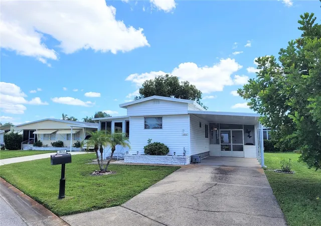 Photo 2 of Manufactured home for sale at 1812 Cypress Point Ln, Sarasota, FL 34234 | MLS# A4706458 | Listing updated on 2026-09-18