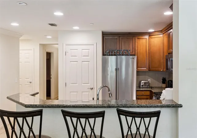 Photo 4 of Condo for sale at 7656 Whisper Way #102, Reunion, FL 34747 | MLS# S5157811 | Listing updated on 2026-10-01
