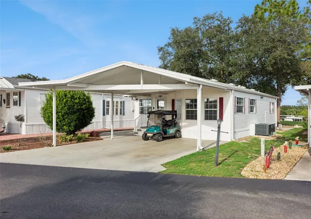 Photo 1 of Manufactured home for sale at 422 Gary Player Dr, Davenport, FL 33837 | MLS# S5157812 | Listing updated on 2026-09-24