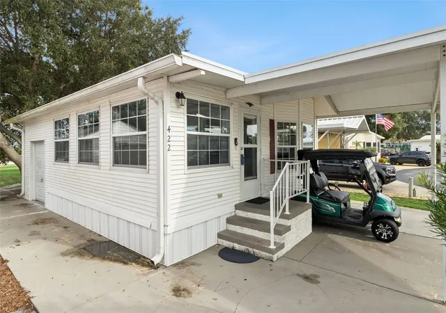 Photo 2 of Manufactured home for sale at 422 Gary Player Dr, Davenport, FL 33837 | MLS# S5157812 | Listing updated on 2026-09-24