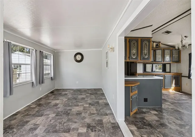 Photo 3 of Manufactured home for sale at 422 Gary Player Dr, Davenport, FL 33837 | MLS# S5157812 | Listing updated on 2026-09-24