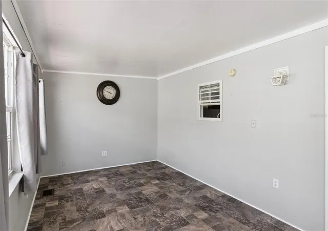 Photo 4 of Manufactured home for sale at 422 Gary Player Dr, Davenport, FL 33837 | MLS# S5157812 | Listing updated on 2026-09-24