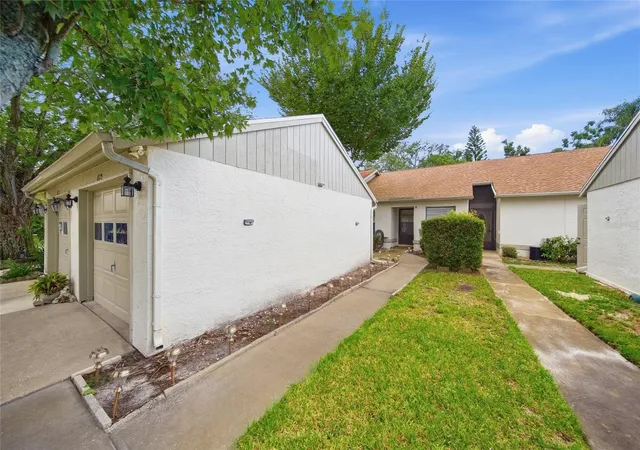 Photo 3 of Single family home for sale at 11715 Spring Tree Ln, Port Richey, FL 34668 | MLS# TB8549576 | Listing updated on 2026-09-19