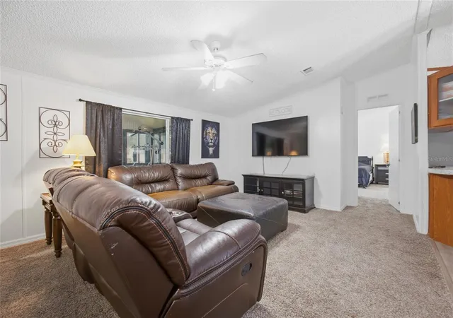 Photo 3 of Manufactured home for sale at 7338 Timber Crst Ln, Zephyrhills, FL 33540 | MLS# TB8549581 | Listing updated on 2026-09-18