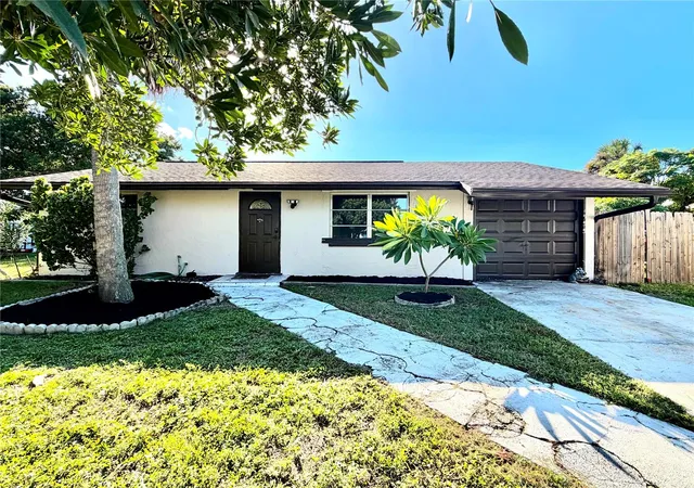 Photo 1 of Single family home for sale at 1555 Beacon Dr, Port Charlotte, FL 33952 | MLS# C7530869 | Listing updated on 2026-10-01