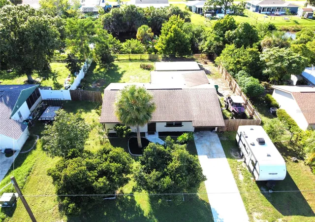 Photo 2 of Single family home for sale at 1555 Beacon Dr, Port Charlotte, FL 33952 | MLS# C7530869 | Listing updated on 2026-10-01