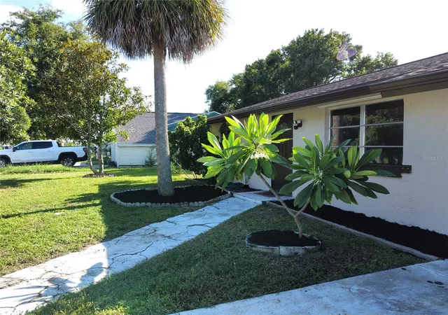 Photo 3 of Single family home for sale at 1555 Beacon Dr, Port Charlotte, FL 33952 | MLS# C7530869 | Listing updated on 2026-10-01