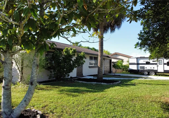 Photo 3 of Single family home for sale at 1555 Beacon Dr, Port Charlotte, FL 33952 | MLS# C7530869 | Listing updated on 2026-10-01