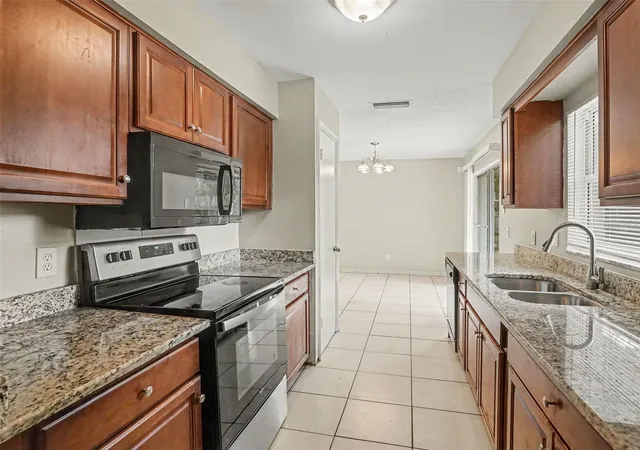Photo 3 of Single family home for sale at 4514 Colbert Ct, Orlando, FL 32808 | MLS# O6442750 | Listing updated on 2026-10-22