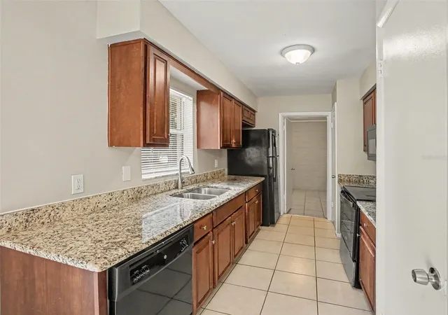 Photo 4 of Single family home for sale at 4514 Colbert Ct, Orlando, FL 32808 | MLS# O6442750 | Listing updated on 2026-10-22