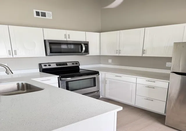 Photo 4 of Townhouse for sale at 2688 Rae Ct, Palm Harbor, FL 34684 | MLS# A4706500 | Listing updated on 2026-09-18