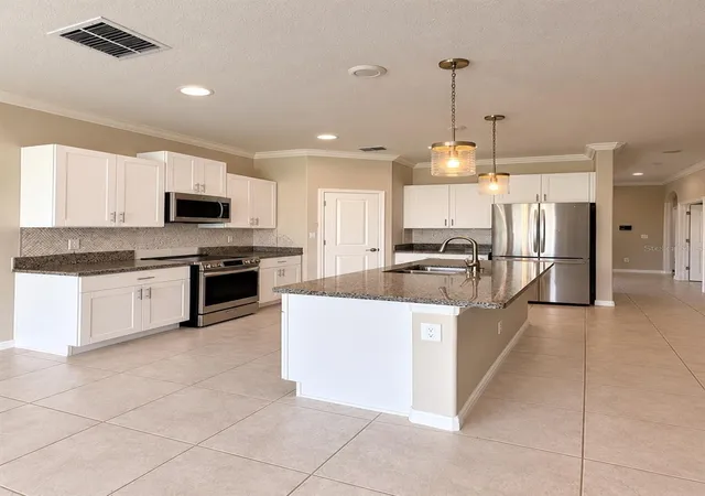 Photo 3 of Single family home for sale at 8882 Flourish Dr, Land O Lakes, FL 34637 | MLS# TB8549630 | Listing updated on 2026-10-15