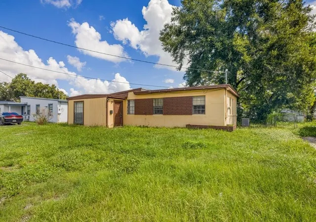 Photo 1 of Single family home for sale at 1227 N Pine Hills Rd, Orlando, FL 32808 | MLS# O6442808 | Listing updated on 2026-09-26