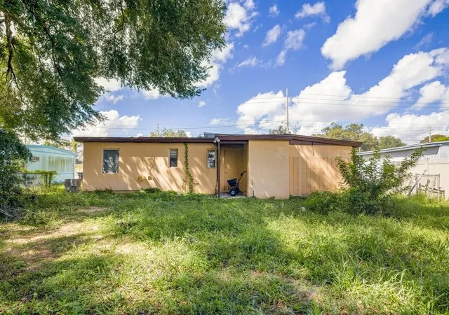 Photo 3 of Single family home for sale at 1227 N Pine Hills Rd, Orlando, FL 32808 | MLS# O6442808 | Listing updated on 2026-09-26