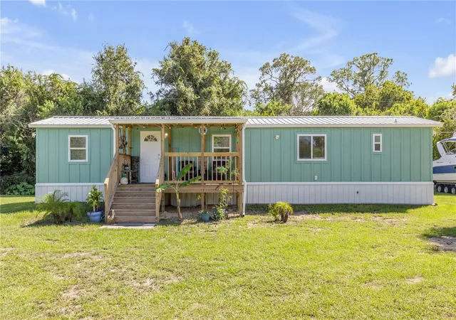 Photo 3 of Manufactured home for sale at 169 W Loop, Oak Hill, FL 32759 | MLS# NS1089284 | Listing updated on 2026-09-25