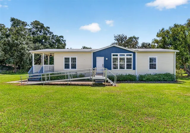 Photo 1 of Manufactured home for sale at 10006 Evanston Ln, Wesley Chapel, FL 33545 | MLS# TB8549707 | Listing updated on 2026-10-09
