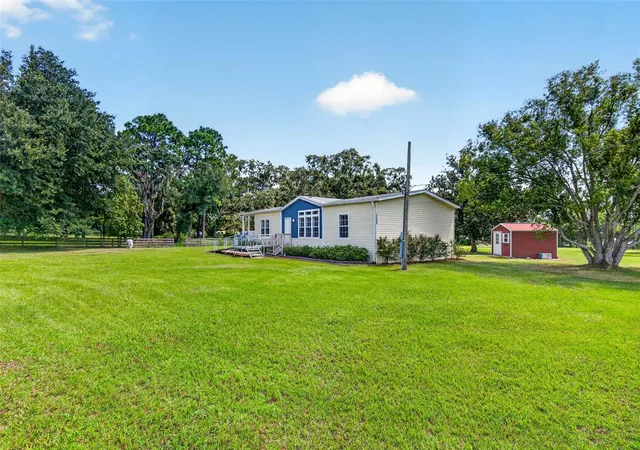 Photo 3 of Manufactured home for sale at 10006 Evanston Ln, Wesley Chapel, FL 33545 | MLS# TB8549707 | Listing updated on 2026-10-09
