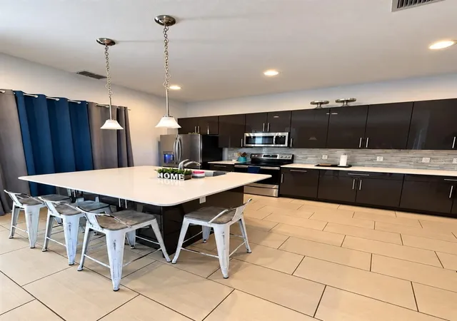 Photo 3 of Single family home for sale at 320 Villa Domani Ct, Davenport, FL 33896 | MLS# TB8549777 | Listing updated on 2026-09-19
