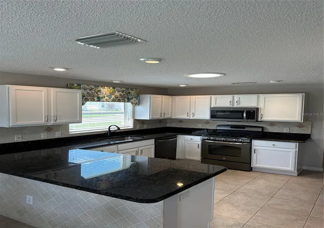 Photo 4 of Single family home for sale at 8053 SE 171st Mcalpin St, The Villages, FL 32162 | MLS# O6442908 | Listing updated on 2026-09-19