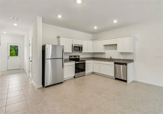 Photo 3 of Townhouse for sale at 217 Mercer St, Deland, FL 32720 | MLS# TB8549803 | Listing updated on 2026-10-01