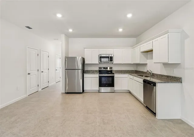 Photo 4 of Townhouse for sale at 217 Mercer St, Deland, FL 32720 | MLS# TB8549803 | Listing updated on 2026-10-01