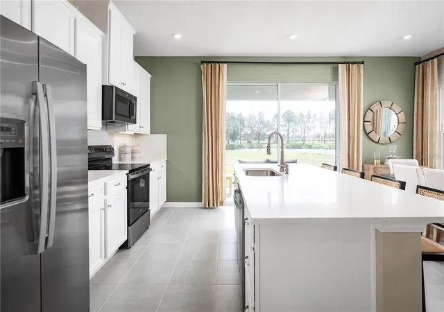 Photo 3 of Townhouse for sale at 12571 Amber Crk Cir, Bradenton, FL 34211 | MLS# W7889616 | Listing updated on 2026-09-18