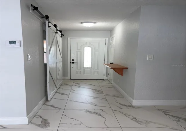 Photo 3 of Single family home for sale at 10647 Regency Ct, Orlando, FL 32825 | MLS# O6442948 | Listing updated on 2026-09-22