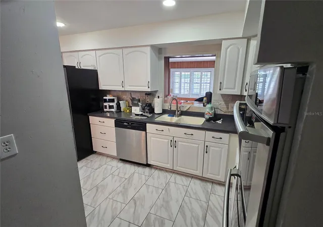 Photo 3 of Single family home for sale at 7710 W Hanna Ave, Tampa, FL 33615 | MLS# TB8549858 | Listing updated on 2026-10-03