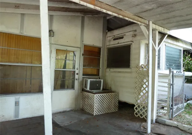 Photo 2 of Manufactured home for sale at 1202 Lucas St, Holiday, FL 34691 | MLS# TB8549866 | Listing updated on 2026-09-24