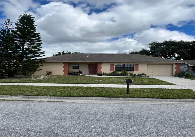 Photo 1 of Single family home for sale at 1238 Fuchsia Dr, Holiday, FL 34691 | MLS# TB8549870 | Listing updated on 2026-10-05