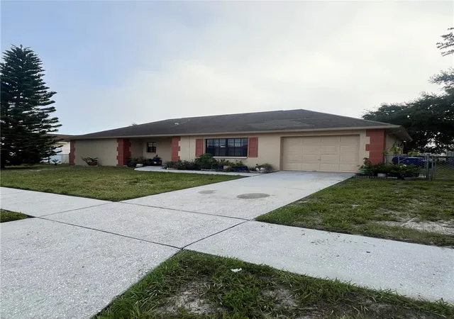 Photo 2 of Single family home for sale at 1238 Fuchsia Dr, Holiday, FL 34691 | MLS# TB8549870 | Listing updated on 2026-10-05