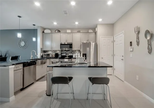Photo 3 of Townhouse for sale at 3725 Plainview Dr, Orlando, FL 32824 | MLS# O6442971 | Listing updated on 2026-09-24
