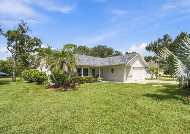 Photo 1 of Single family home for sale at 2429 Birdie Ln, Spring Hill, FL 34606 | MLS# W7889621 | Listing updated on 2026-10-06