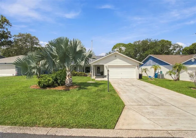 Photo 3 of Single family home for sale at 2429 Birdie Ln, Spring Hill, FL 34606 | MLS# W7889621 | Listing updated on 2026-10-06