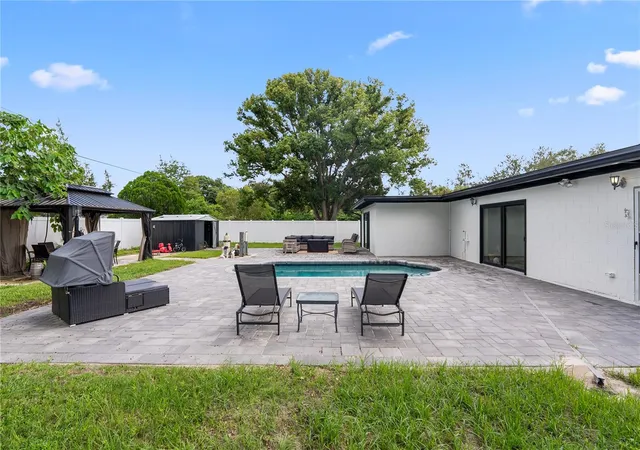 Photo 2 of Single family home for sale at 1307 Baltimore Dr, Orlando, FL 32810 | MLS# TB8549936 | Listing updated on 2026-09-19
