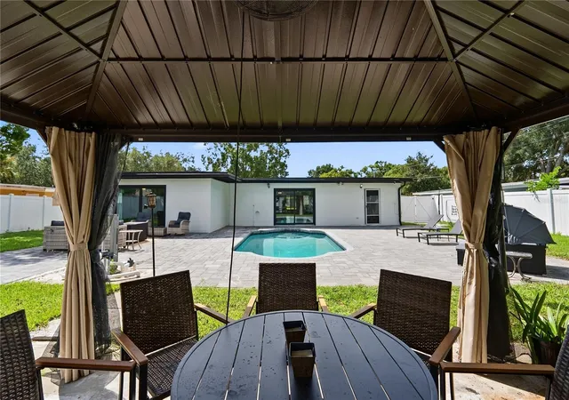 Photo 4 of Single family home for sale at 1307 Baltimore Dr, Orlando, FL 32810 | MLS# TB8549936 | Listing updated on 2026-09-19