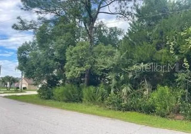 Photo 1 of Land for sale at 94 White Hall Dr, Palm Coast, FL 32164 | MLS# FC321554 | Listing updated on 2026-09-19