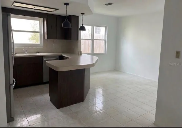 Photo 3 of Single family home for sale at 8345 Fox Holw Dr, Port Richey, FL 34668 | MLS# TB8549954 | Listing updated on 2026-09-19