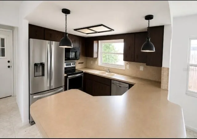 Photo 4 of Single family home for sale at 8345 Fox Holw Dr, Port Richey, FL 34668 | MLS# TB8549954 | Listing updated on 2026-09-19
