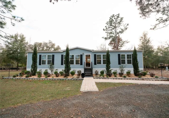 Photo 1 of Manufactured home for sale at 7670 Ne 97th Court, Bronson, FL 32621 | MLS# S5157877 | Listing updated on 2026-09-22