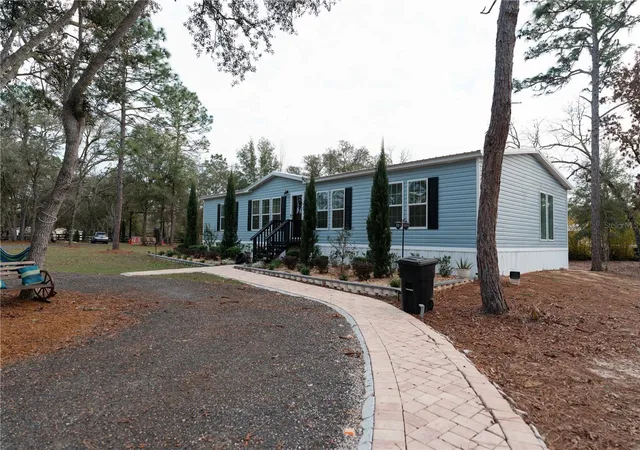 Photo 2 of Manufactured home for sale at 7670 Ne 97th Court, Bronson, FL 32621 | MLS# S5157877 | Listing updated on 2026-09-22